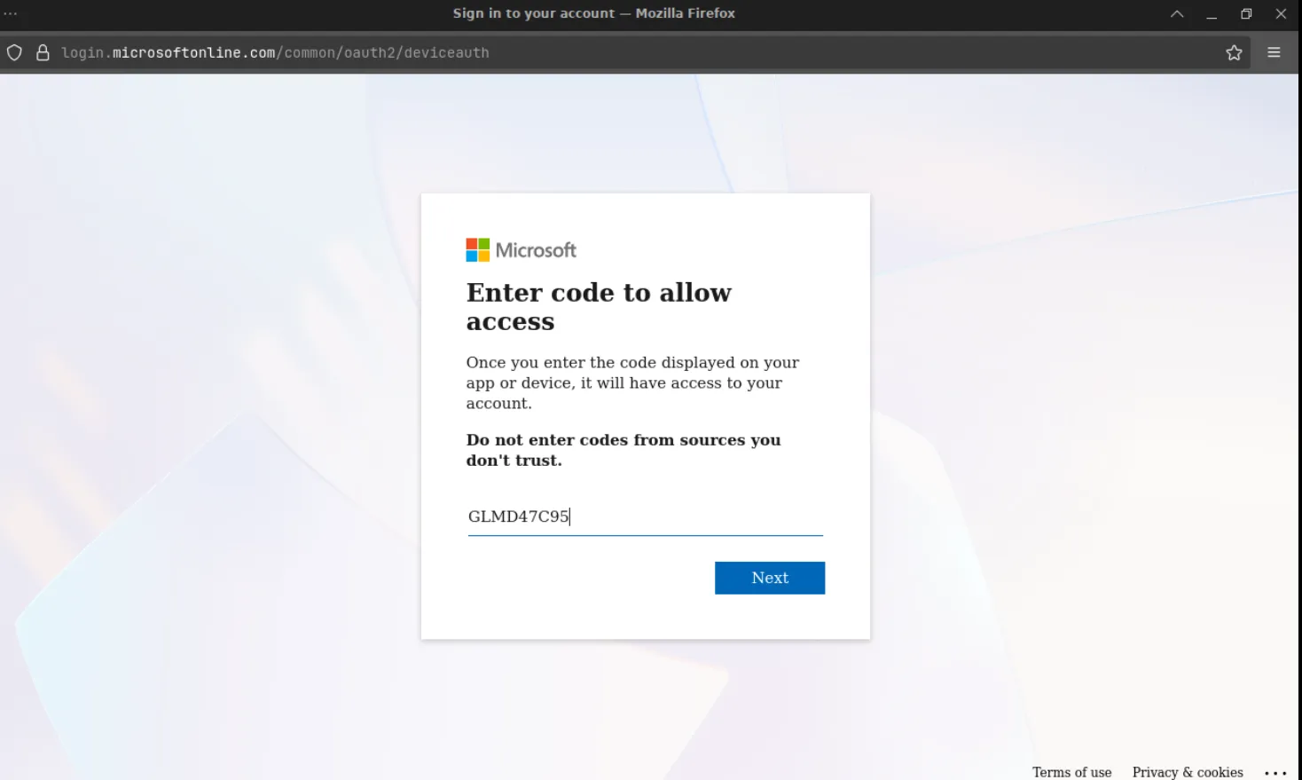 Stage 4: the same code from the fake page, entered on the genuine Microsoft page