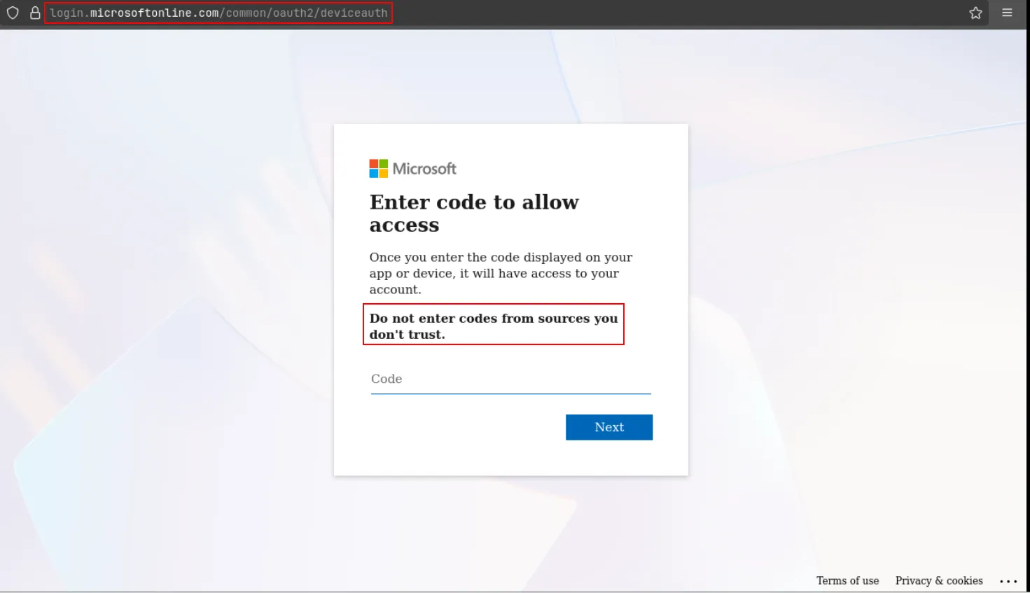 Stage 4: the genuine Microsoft device-login page, with its built-in warning